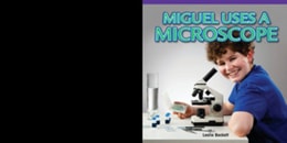 Miguel Uses a Microscope